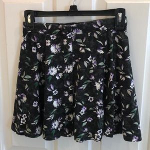 Super cute button down floral skirt!